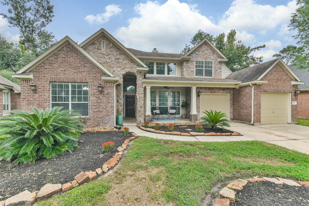 view of front of home with a porch and a garage