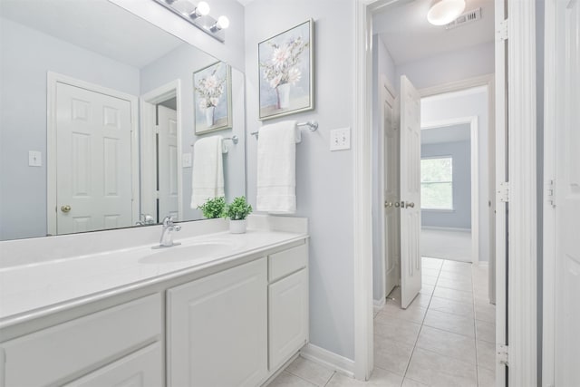 bathroom featuring vanity and tile patterned flooring