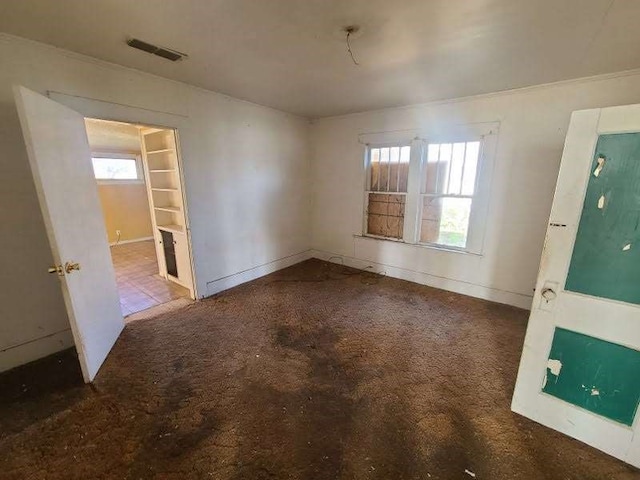 view of carpeted spare room