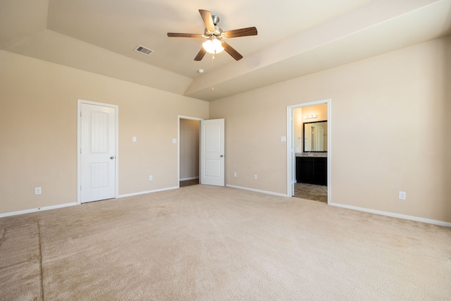 spare room featuring ceiling fan and light colored carpet