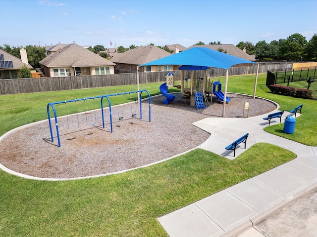 view of jungle gym with a lawn