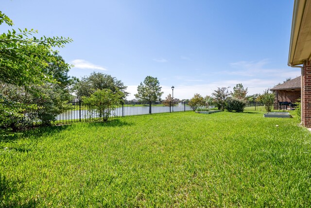 view of yard with a water view