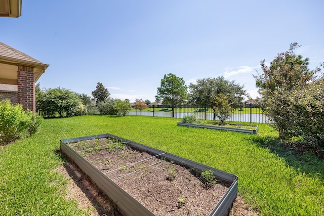 view of yard with a water view