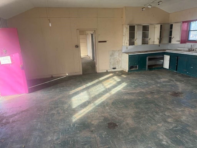 kitchen featuring vaulted ceiling