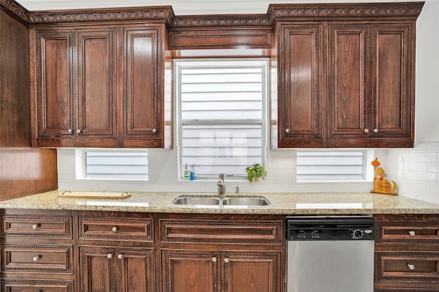 kitchen with plenty of natural light, dishwasher, and sink