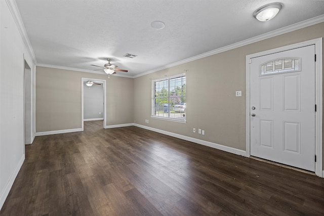 foyer featuring ceiling fan, dark hardwood / wood-style floors, a textured ceiling, and ornamental molding