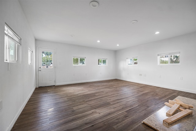 interior space with dark hardwood / wood-style flooring