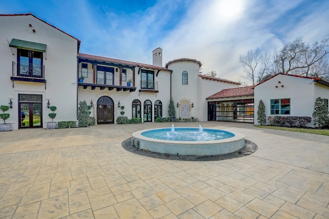 view of pool featuring pool water feature