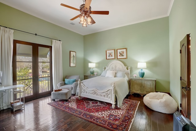 bedroom featuring access to exterior, french doors, dark hardwood / wood-style flooring, and ceiling fan