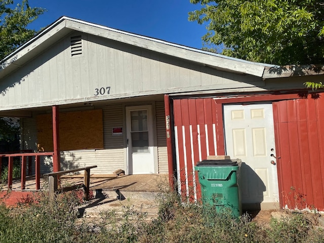 exterior space featuring covered porch