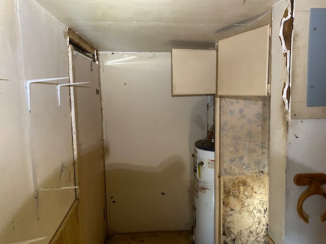 utility room featuring gas water heater