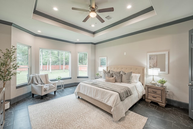 bedroom with a raised ceiling, crown molding, and ceiling fan