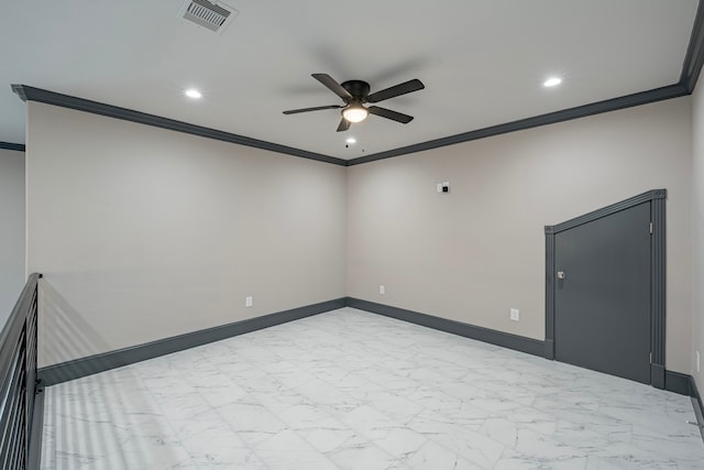 unfurnished room featuring ceiling fan and ornamental molding