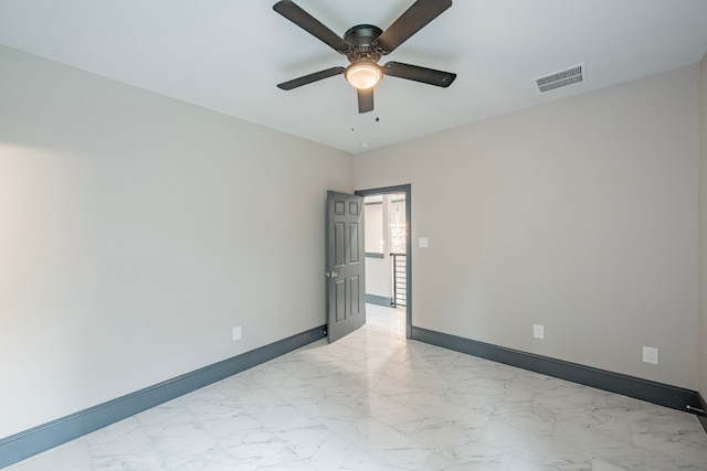 unfurnished room featuring ceiling fan