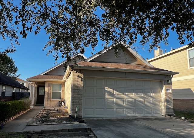 single story home featuring a garage