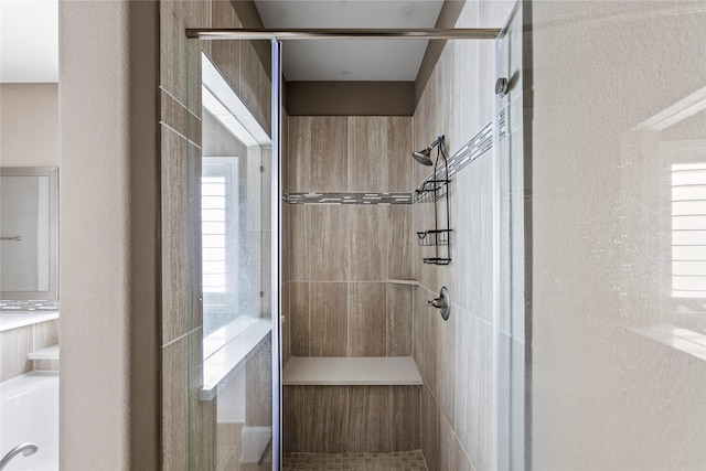 bathroom with independent shower and bath