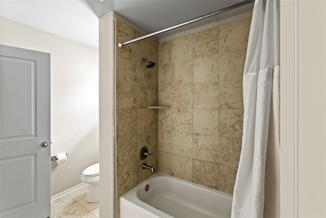 bathroom featuring a textured ceiling, toilet, tile patterned flooring, and shower / bath combo with shower curtain