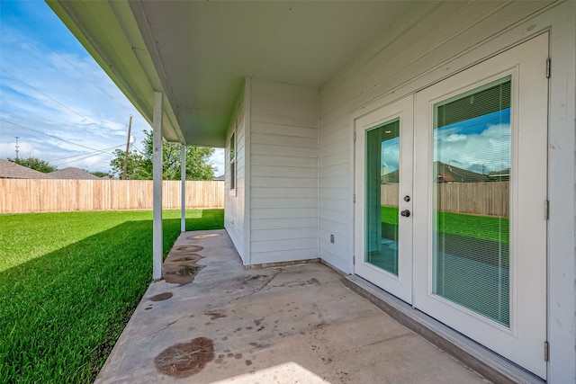 8705 Rowen Ct, Needville, TX 77461 - view of patio with french doors and fence