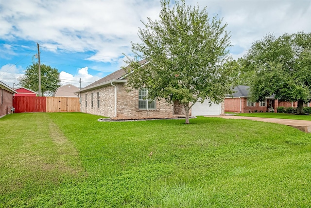8705 Rowen Ct, Needville, TX 77461 - exterior space with fence, driveway, and an attached garage