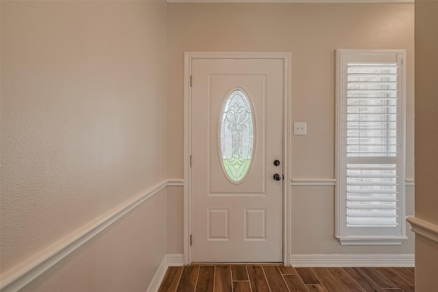 8705 Rowen Ct, Needville, TX 77461 - entryway with dark wood finished floors and baseboards