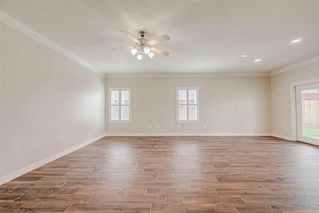 unfurnished room with crown molding, ceiling fan, and wood-type flooring