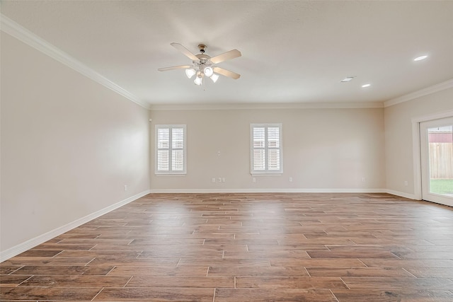 8705 Rowen Ct, Needville, TX 77461 - empty room with crown molding, ceiling fan, wood finished floors, and a healthy amount of sunlight