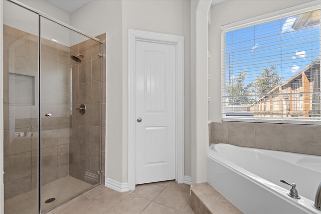 bathroom featuring separate shower and tub and tile patterned floors