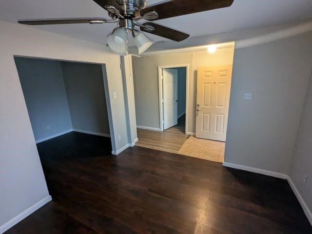 spare room with hardwood / wood-style floors and ceiling fan