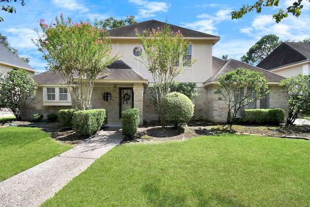 view of front of house with a front lawn