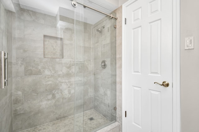 bathroom with an enclosed shower