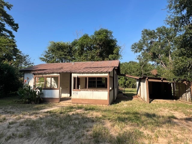 exterior space with an outbuilding