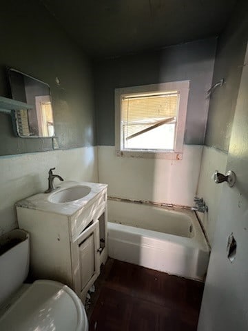 full bathroom featuring vanity, toilet, and shower / tub combination