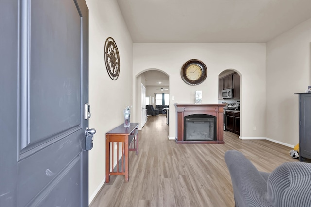 foyer entrance with light wood-type flooring