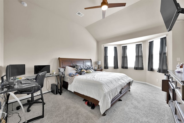 carpeted bedroom with ceiling fan and lofted ceiling