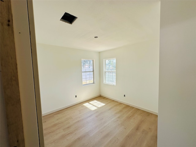 empty room with light wood-type flooring