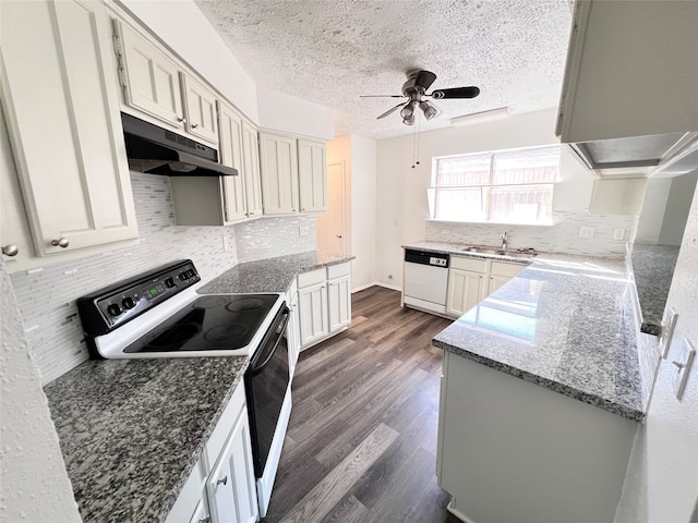 kitchen featuring white appliances, white cabinetry, dark wood-type flooring, ceiling fan, and a textured ceiling