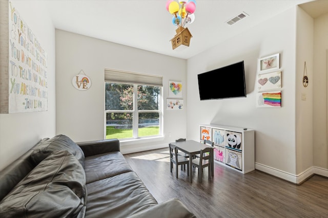 living room with dark wood-type flooring