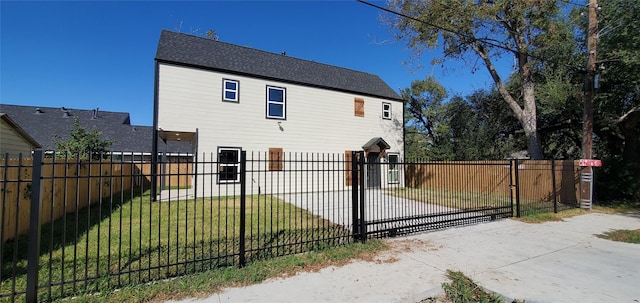 view of side of property with a yard