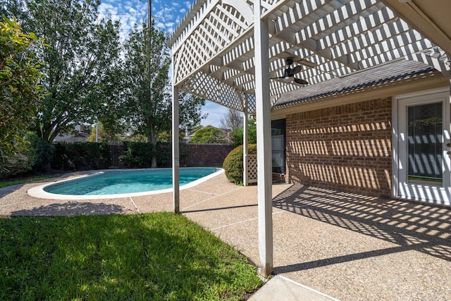 view of swimming pool with a pergola and a patio area