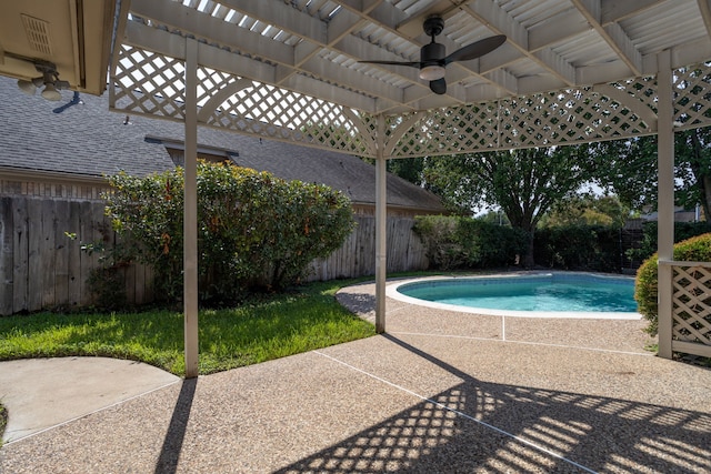 view of pool featuring ceiling fan, a patio area, and a pergola