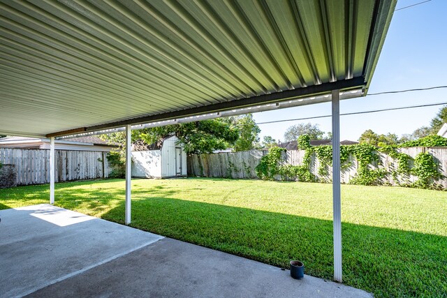 view of patio / terrace with a storage shed