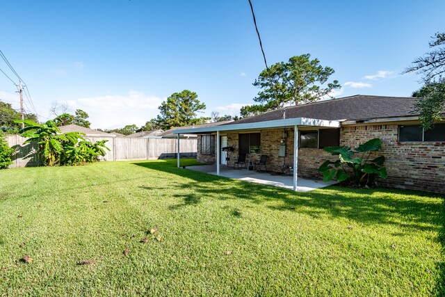 view of yard with a patio area