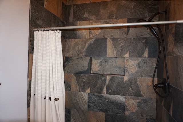 details with a shower with curtain