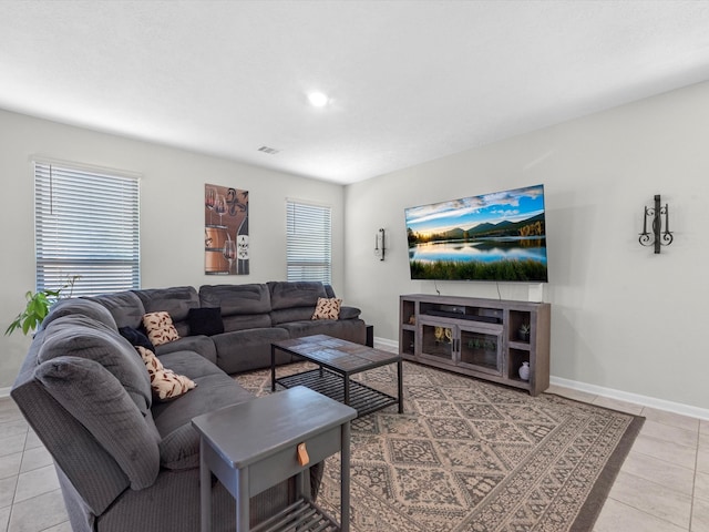 living room featuring light tile patterned floors