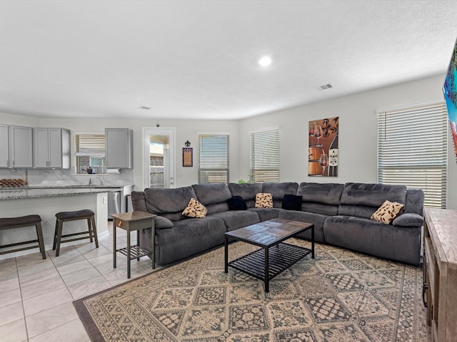 living room featuring light tile patterned floors