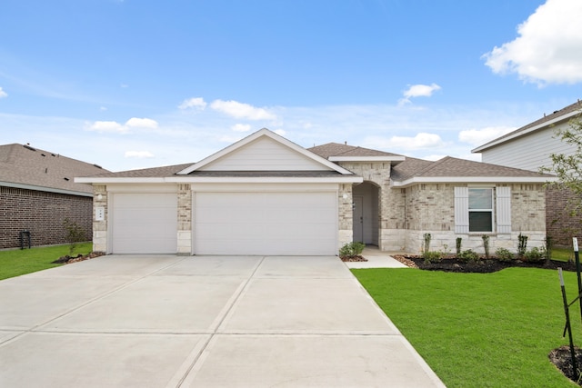 ranch-style house with a garage and a front yard