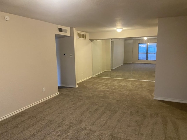 5669 Birchmont Dr Unit A, Houston, TX 77091 - unfurnished bedroom featuring carpet, baseboards, and a closet