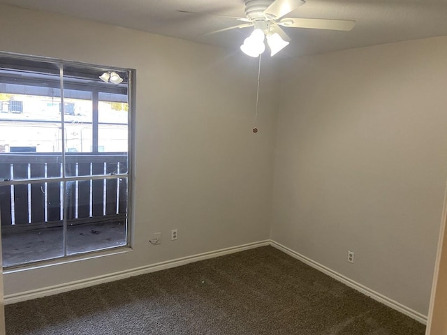 5669 Birchmont Dr Unit A, Houston, TX 77091 - empty room featuring dark colored carpet, ceiling fan, and baseboards