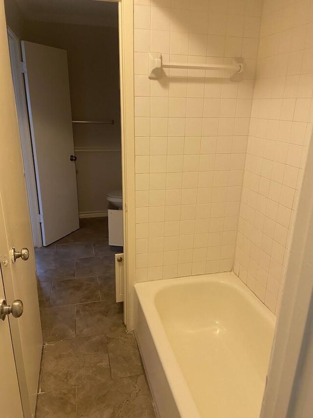 5669 Birchmont Dr Unit A, Houston, TX 77091 - bathroom with stone finish floors