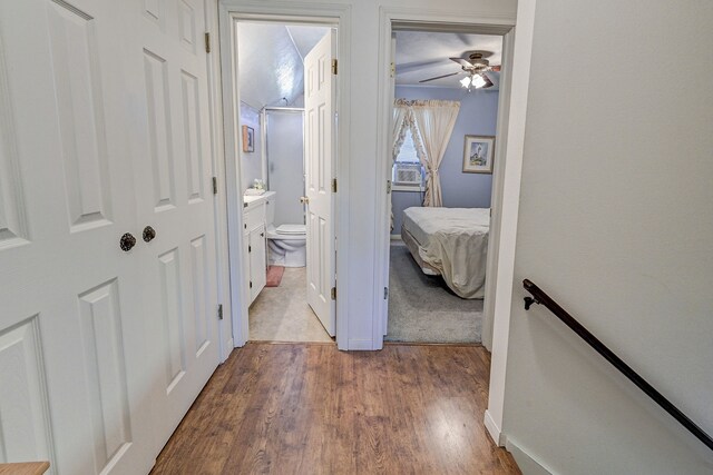 hallway featuring hardwood / wood-style flooring